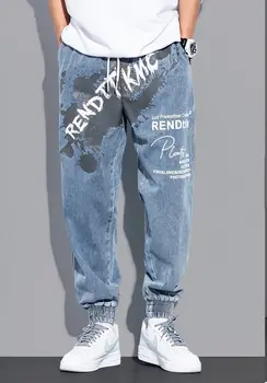 ג ' ינס של גברים רופפים. גרפיטי הדפסה בסגנון יפני רחוב חורש הרמון מכנסיים מכנסיים בגדים לנוער תלמיד